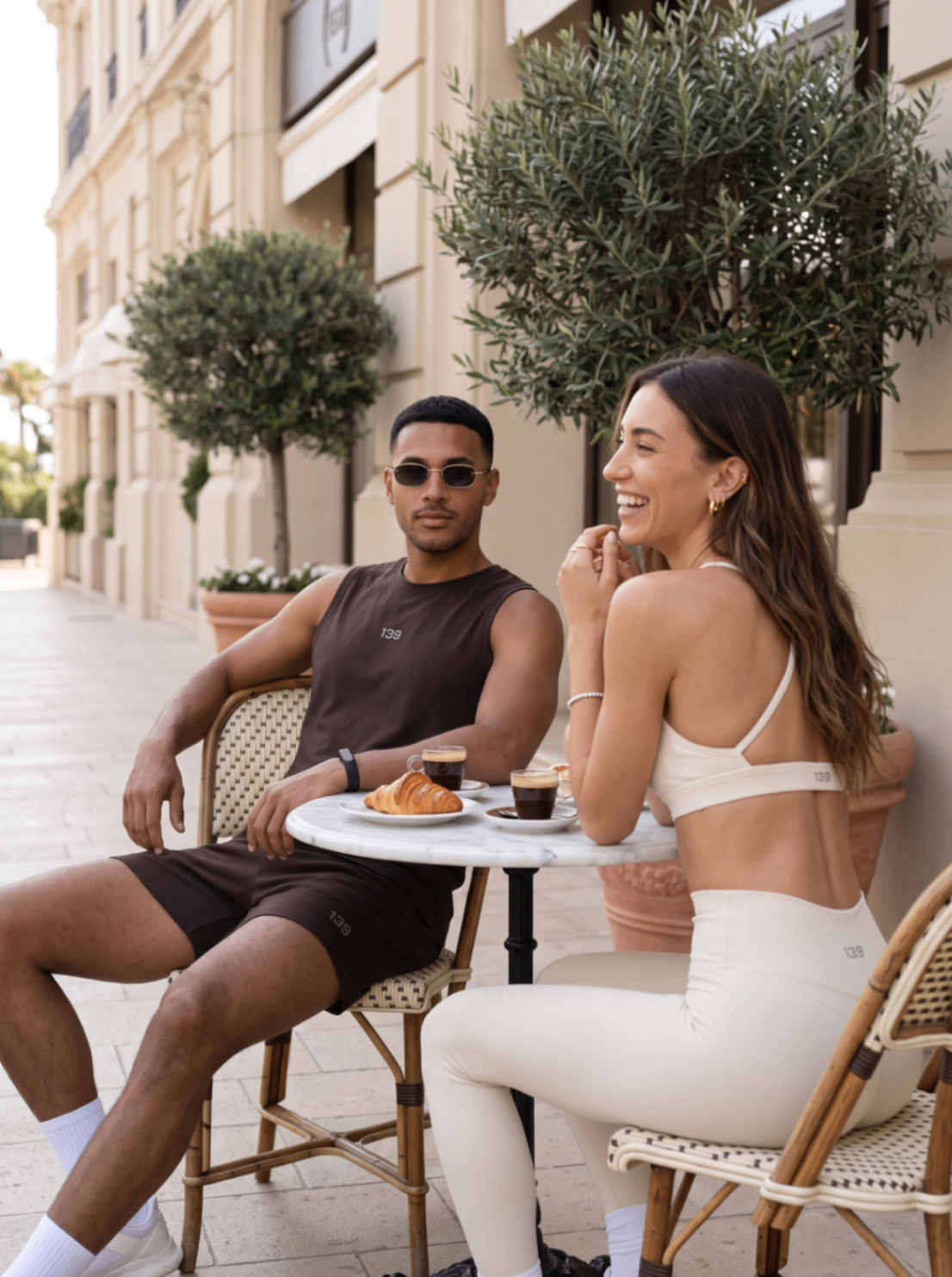 139 couple at a Monaco café